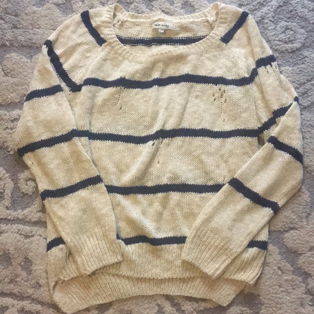 Cream and navy distressed sweater